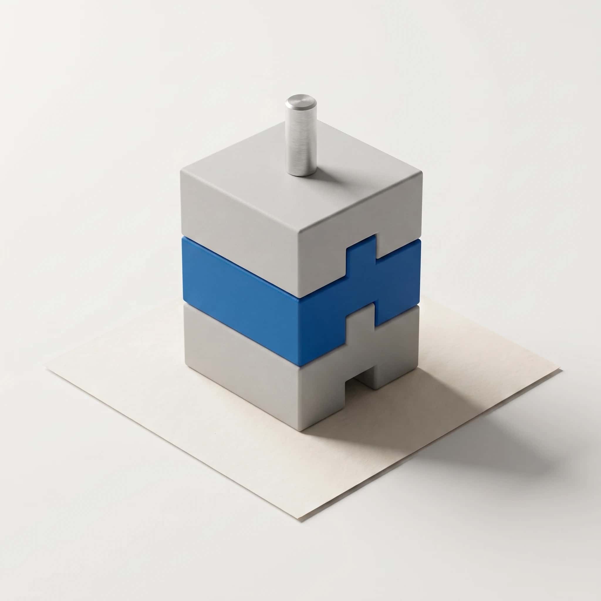 Render van drie gestapelde grijze blokken die precies in elkaar grijpen, het middelste blauw